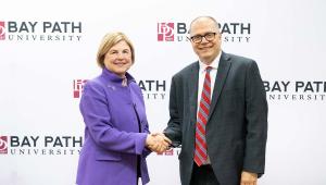 President Doran and President Healey shake hands